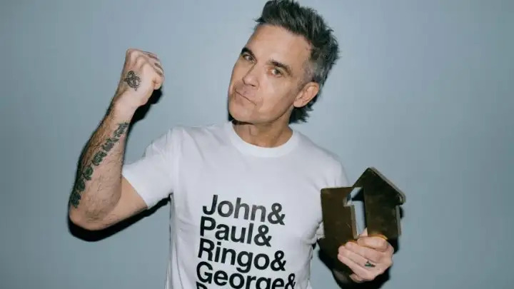 Robbie Williams pode bater recorde dos Beatles em parada musical nesta semana